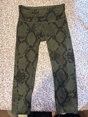 lululemon athletica Olive Green and Black Snake Print Leggings. Size 2